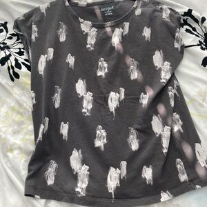 I’m selling a grey and white paint splash fairy from Cat & Jack